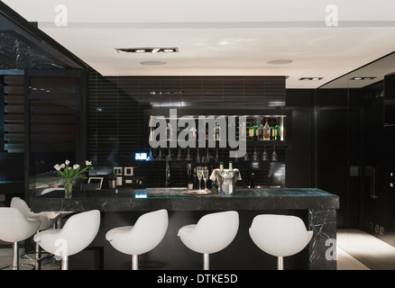 Empty stools in bar Stock Photo