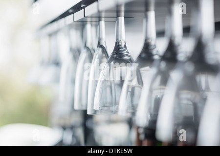 Close up of wine glasses in bar Stock Photo