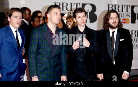London, UK . 19th Feb, 2014. Matt Helders (r-l) , Nick O'Malley, singer Alex Turner and Jamie Cook of Arctic Monkeys arrive at the BRIT Awards 2014 at O2 Arena in London, Great Britain, on 19 February 2014. Photo: Hubert Boesl Credit:  dpa picture alliance/Alamy Live News Stock Photo
