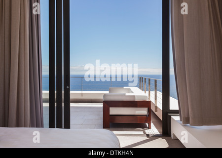 Photo inspiration: Scenic Balcony With Modern Furniture Overlooking Nature Stock Photo Photo Inspiration