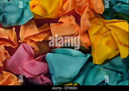 Colorful group of crumpled paper balls, close up. Stock Photo