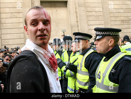bloodied protester rioting outside the Bank in the City of London during G20 demonstration Stock Photo