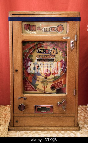 Bryans vintage ALLWIN wooden arcade slot machine  Allwin polo machines  'Win a Polo' Antique Slot Machine on Stand Stock Photo