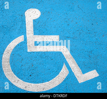 Blue Square Handicapped Wheelchair Accessible Symbol Sign On A London Blue square handicapped wheelchair accessible symbol sign on a london
