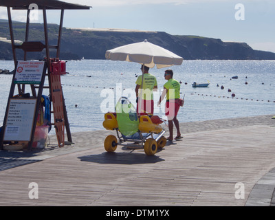 Two life guards on duty in the town Playa San Juan,Tenerife Canary Islands Spain Stock Photo