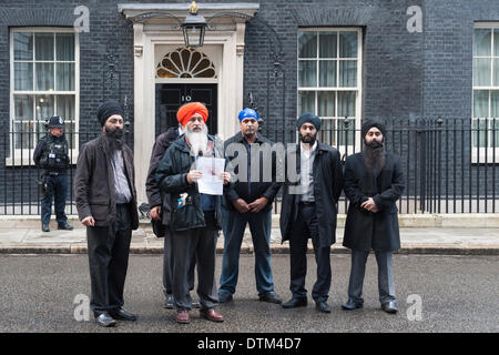 Downing Street,, London, UK. 20th February 2014. Members of the Sikh UK Council petition Downing Street in response to recent allegations the UK 'colluded' with India in the attack on the Golden Temple at Amritsar in June 1984. The Sikh community is calling for a full independent enquiry. Credit:  Lee Thomas/Alamy Live News Stock Photo