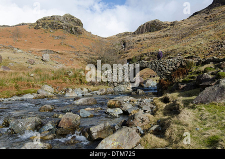 A traditional stone bridge in Eskdale, Lake District, England Stock Photo