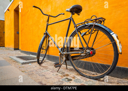A bike on the sidewalk in Copenhagen, Denmark. Stock Photo