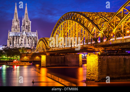 Cologne, Germany at the cathedral and bridge over the Rhine River. Stock Photo