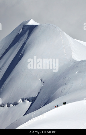 Mountain climbers descending from the Aiguille du Midi (Mont Blanc ...