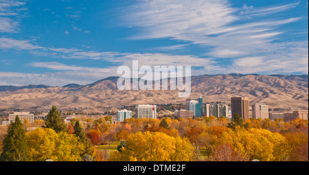 City of Boise Skyline in fall colors with Ann Morrison Park in the Foreground and Mountains Beyond. Boise, Idaho, USA Stock Photo