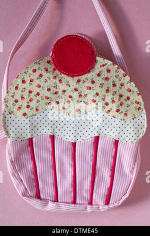 cupcake bag set on pink background Stock Photo