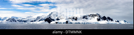 ANTARCTICA - A high resolution panorama of snow and ice-covered mountains along the Gerlache Strait on the western coast of the Antarctic Peninsula. Stock Photo