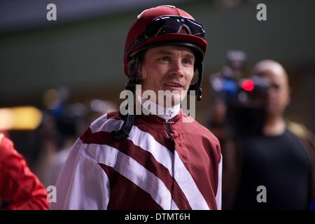 Meydan Racecourse, Dubai, UAE. 20th Feb 2014. Richard Mullen the jockey in the parade ring before the start of Race 5 of the 7th Meeting of the Dubai World Cup Carnival at Meydan Racecourse Credit:  Tom Morgan/Alamy Live News Stock Photo