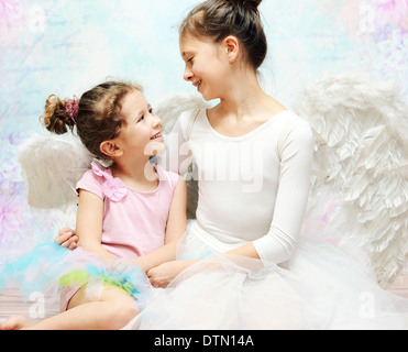 Two cute sisters enjoying their company Stock Photo