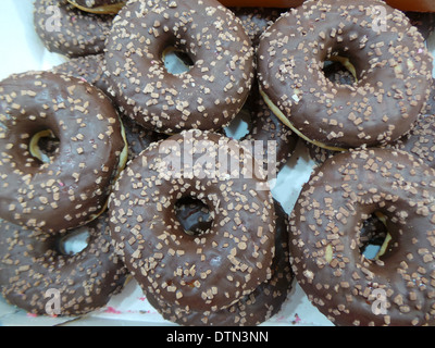 Glazed chocolate donuts Stock Photo