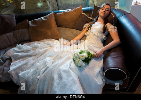 Bride portrait on couch Stock Photo