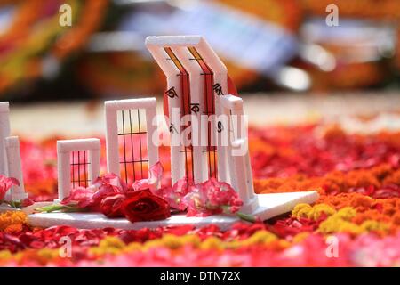 Dhaka, Bangladesh. 20th February 2014. Replica of the Cental Shaheed Minar  is seen  on the occasion of International Mother Language Day, in Dhaka. The gathering marks 60 years since police fired at thousands of protesters at a university in Bangladesh demanding that Bengali be declared the state language. The deaths marked the start of a nearly two-decades-long struggle for Bangladesh which ended in victory in the 1971 independence war with Pakistan Stock Photo