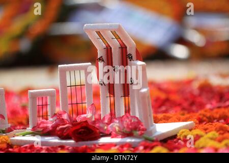 Dhaka, Bangladesh. 20th February 2014. Replica of the Cental Shaheed Minar  is seen  on the occasion of International Mother Language Day, in Dhaka. The gathering marks 60 years since police fired at thousands of protesters at a university in Bangladesh demanding that Bengali be declared the state language. The deaths marked the start of a nearly two-decades-long struggle for Bangladesh which ended in victory in the 1971 independence war with Pakistan Stock Photo