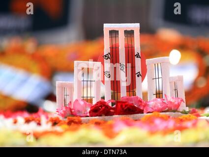 Dhaka, Bangladesh. 20th February 2014. Replica of the Cental Shaheed Minar  is seen  on the occasion of International Mother Language Day, in Dhaka. The gathering marks 60 years since police fired at thousands of protesters at a university in Bangladesh demanding that Bengali be declared the state language. The deaths marked the start of a nearly two-decades-long struggle for Bangladesh which ended in victory in the 1971 independence war with Pakistan Stock Photo