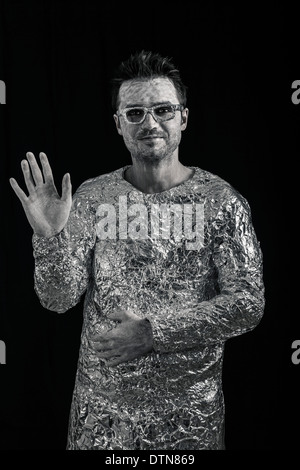 Portrait of spaceman greeting. Stock Photo