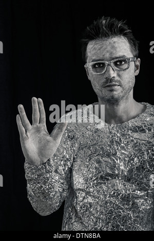 Portrait of spaceman greeting. Stock Photo