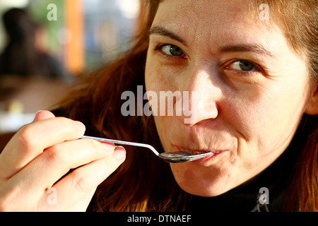 Young Turkish Women Tasting Sweet Desert