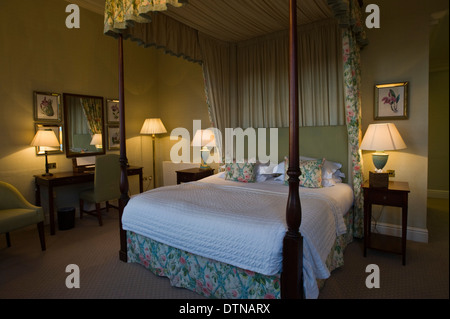 Bedroom with four poster bed at The Talbot Hotel in Malton North Yorkshire England UK Stock Photo