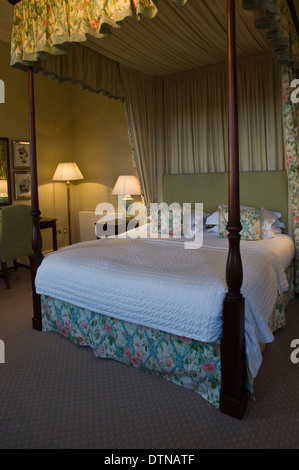 Bedroom with four poster bed at The Talbot Hotel in Malton North Yorkshire England UK Stock Photo