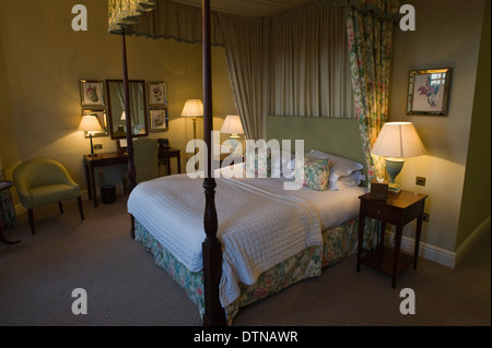 Bedroom with four poster bed at The Talbot Hotel in Malton North Yorkshire England UK Stock Photo