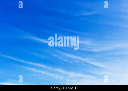 Wispy white clouds against an azure clear blue Colorado sky Stock Photo
