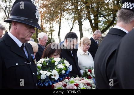 One minutes silence is observed at the dedication service for PC James Gordon, who was killed on duty in 1893. Stock Photo