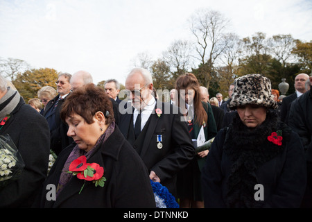 Dozens of people came to remember 'forgotten hero' PC James Gordon at St Helens Cemetary. PC Gordon was killed on duty in 1893. Stock Photo