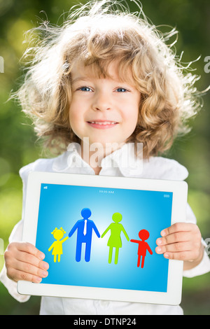 Child holding tablet PC Stock Photo