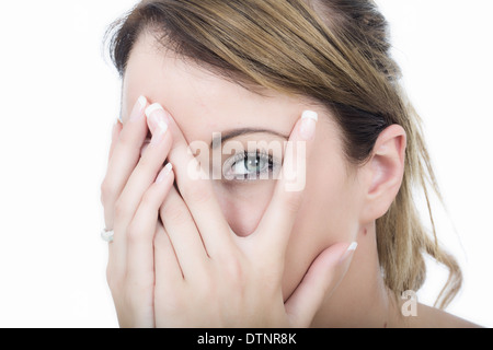 Attractive Young Woman Peeping Stock Photo