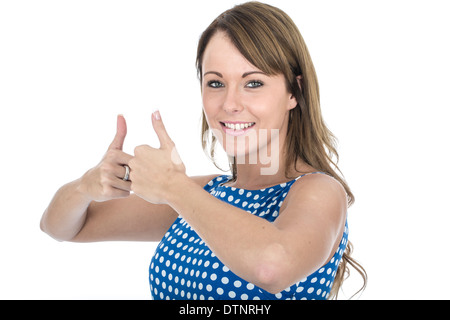 Young Woman Wearing Blue Polka Dot Dress Thumbs Up Stock Photo