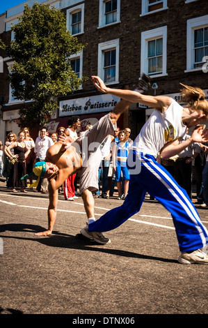 Capoeira Dancers at Notting Hill Carnival, London, UK Stock Photo