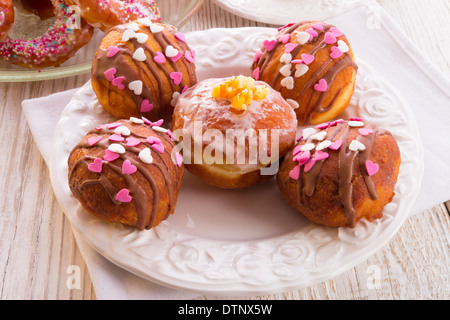 bismarck doughnuts on a plate Stock Photo