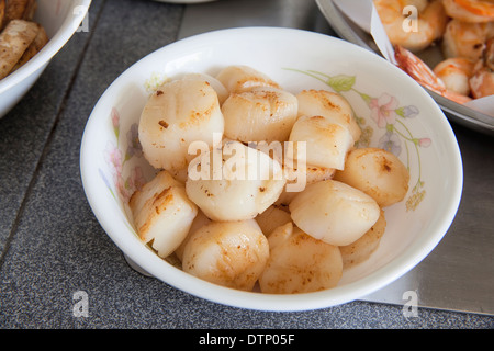 Cooked Pan Seared Sea Scallops as Ingredients for Chinese Big Feast Bowl Closeup Stock Photo