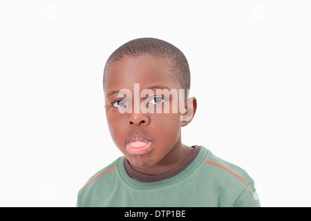 Boy sticking out his tongue Stock Photo