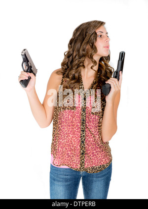 Young girl model blowing smoke from gun barrel Stock Photo