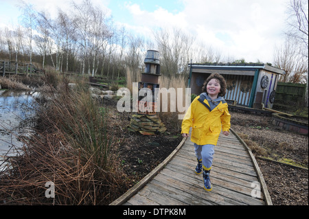 Child exploring at the WWT london wetland centre, in south West london, uk Stock Photo