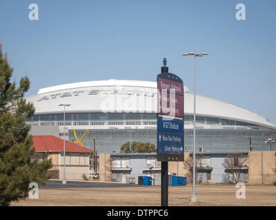 Arlington, Texas, USA. 22nd February 2014. Largest indoor arena in the world needs the largest sign, just to help fans find it. Credit:  J. G. Domke/Alamy Live News Stock Photo