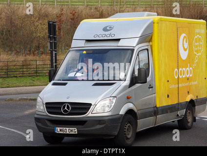 An Ocado van entering a roundabout in Coulsdon, Surrey, England Stock Photo