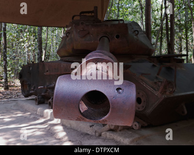 An ex- US Army M41 'Walker Bulldog' light tank destroyed by a delay mine in 1970. Cu Chi Tunnels, Saigon, Vietnam. Stock Photo