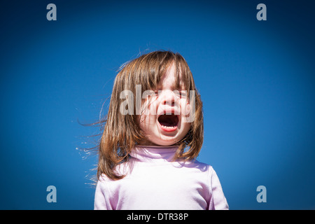 A child cries on a hot summer's day Stock Photo