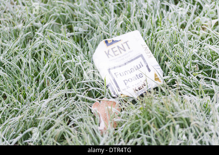 Cigarettes package dumped on the ground Stock Photo