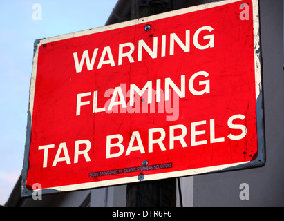 A warning sign 'Flaming Tar Barrels'. Stock Photo