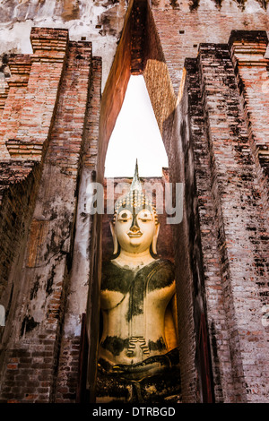 700 years ancient big buddha statue Sukhothai,Thailand. Named Talkable buddha statue, Wat Si Chum temple, Sukhothai, Thailand Stock Photo