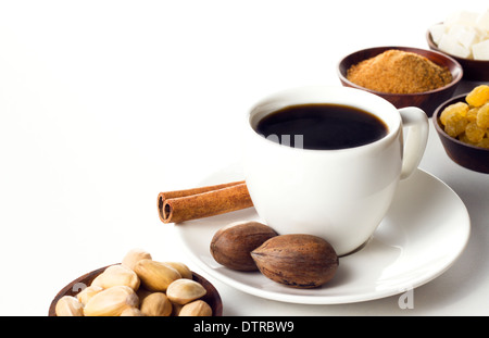 natural coffee with nuts and sugar on white table Stock Photo